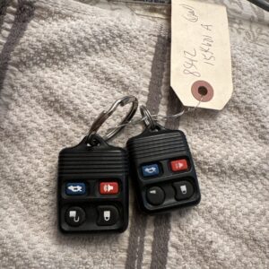 Genuine Ford Keyless Entry Transmitter 8S4Z-15K601-A (1) New (1) Used