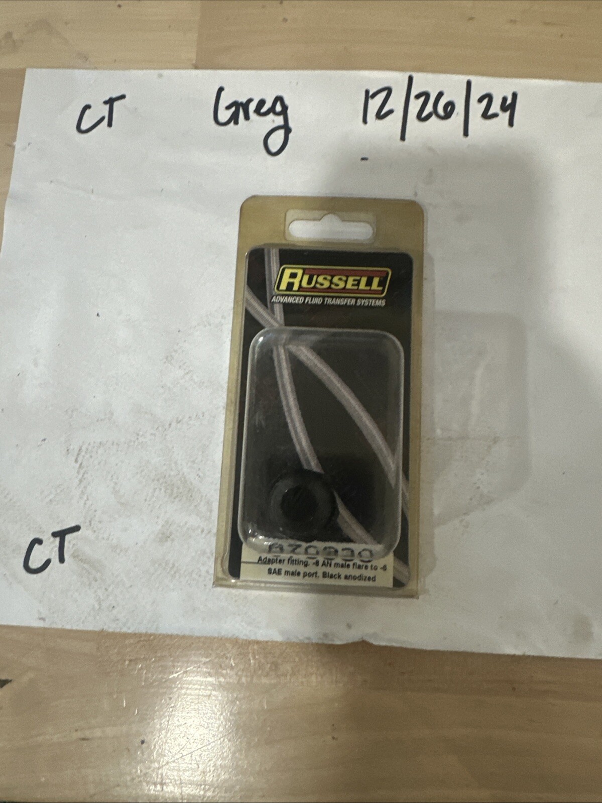 Russell 670930 Adapter fitting.-8 AN male flare to-6 SAE male port. Black anodiz