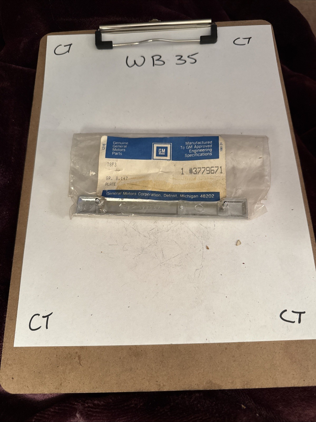 1961 Corvette NOS Genuine GM 3779671 Trim Plate Front Fender Emblem