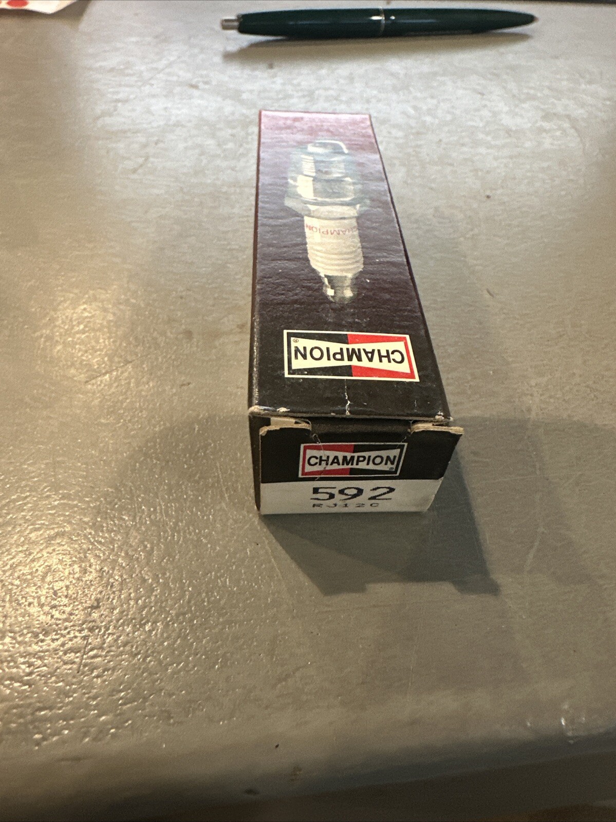 Champion Genuine OEM Replacement Spark Plug, RJ12C