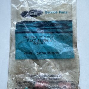 New Old Stock Ford Genuine Inserts Set of 2 Part #F4ZZ-6E086-A.