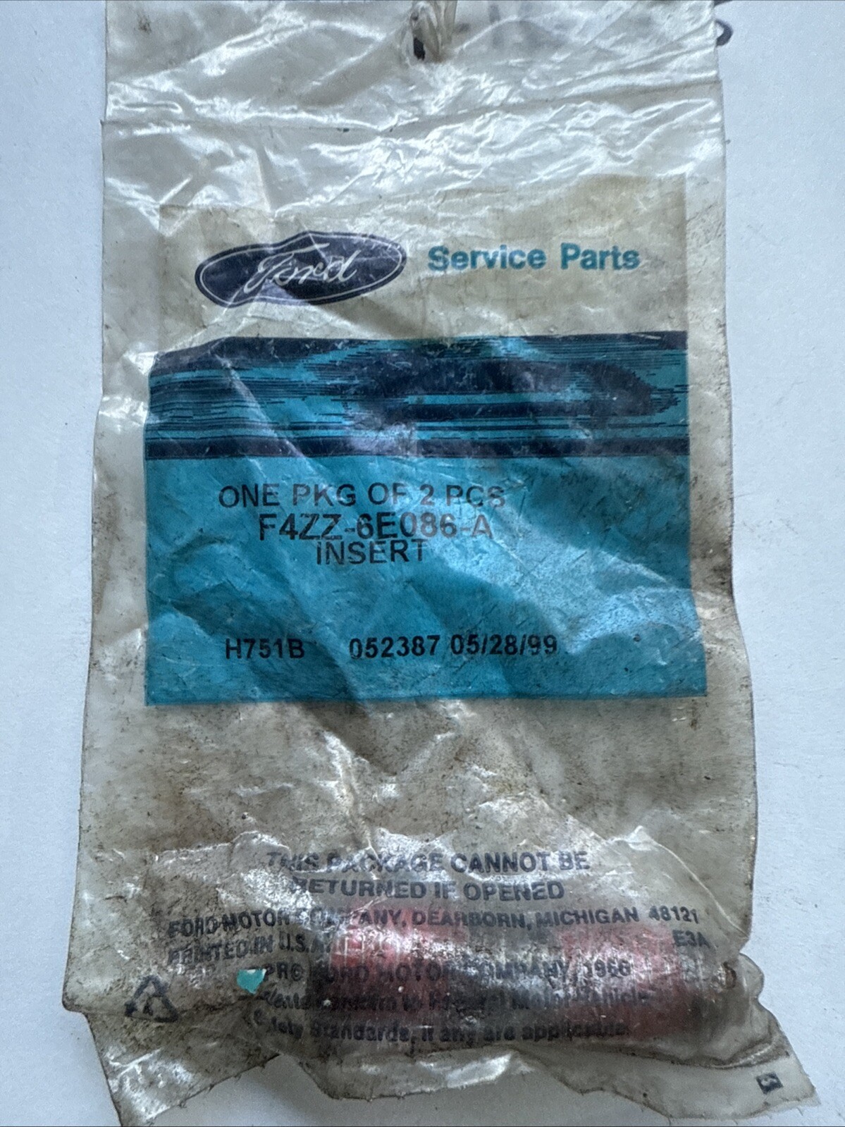New Old Stock Ford Genuine Inserts Set of 2 Part #F4ZZ-6E086-A.