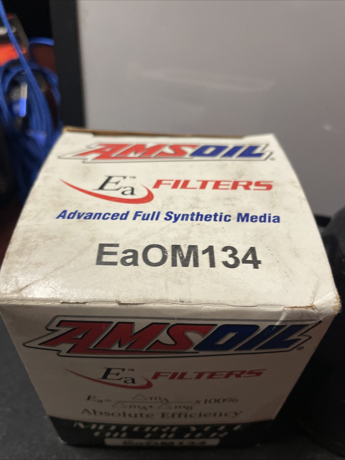 AMSOIL Oil Filter EAOM134 (3/4 underneath) Motorcycle - Image 3