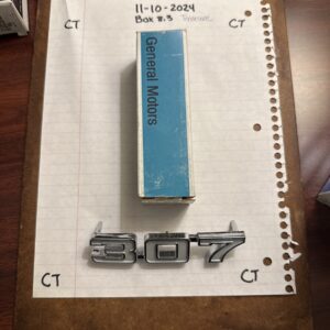 GM/CHEVROLET 3957933 (307)  FRT FENDER EMBLEM, 69 CAMARO, 70-74 NOVA, NOS