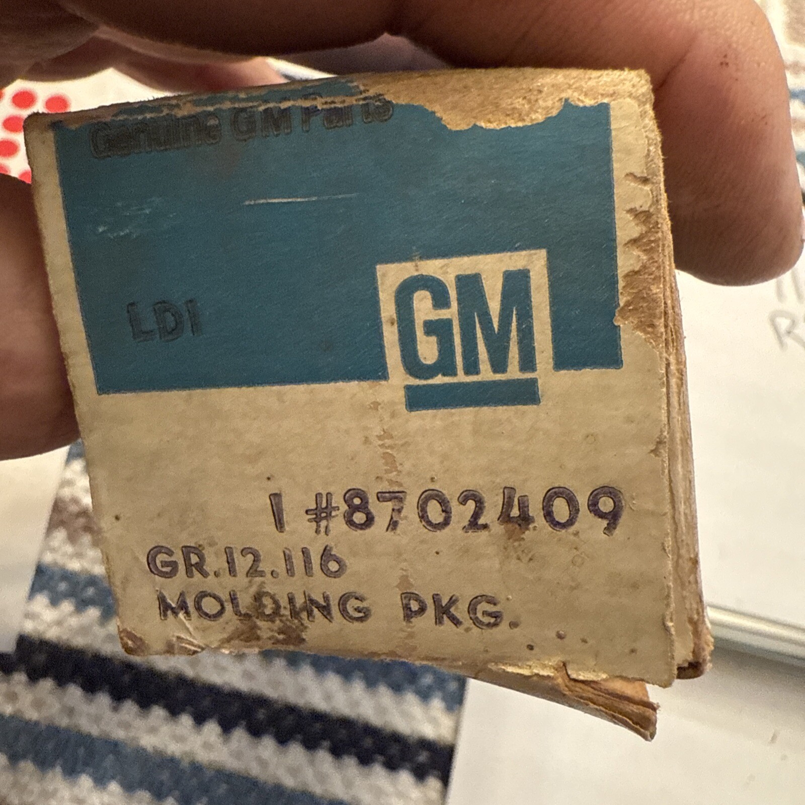 Genuine Gm Mounding Nos OEM 8702409 - Image 3