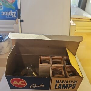 AC Guide miniature lamps vintage L1124 12V 32 C.P. NOS 1 Box Of 9 Bulbs Open Box